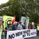 Protesters Rip into NATO representatives at Panel